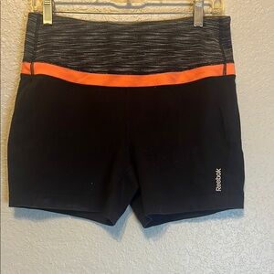 Reebok Women's Black and Orange Shorts